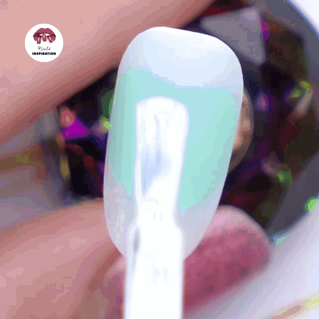 a close up of a nail with a sticker that says rude inspiration on it