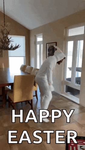 a person in an easter bunny costume is dancing in a living room with the words happy easter below them