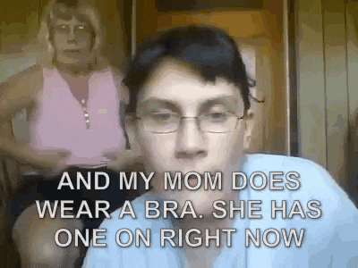a woman wearing glasses says and my mom does wear a bra she has one on right now .