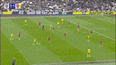 a soccer game is being played in a stadium with advertisements for jd sports.com