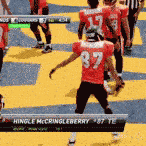 a football player wearing a red jersey with the number 87 on it