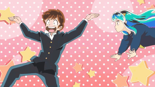 a boy and a girl are dancing in front of a pink background with polka dots