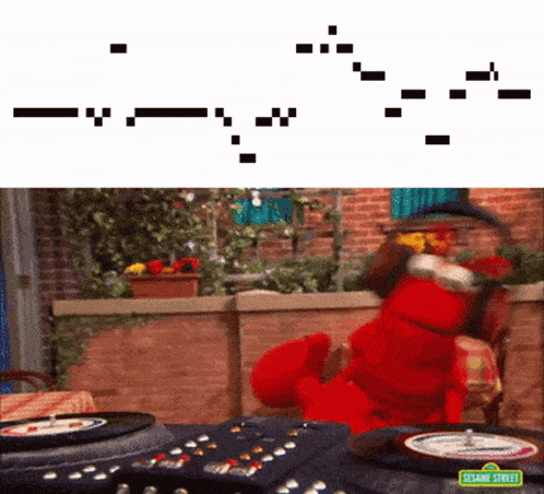 elmo from sesame street is playing a game of roulette on a table