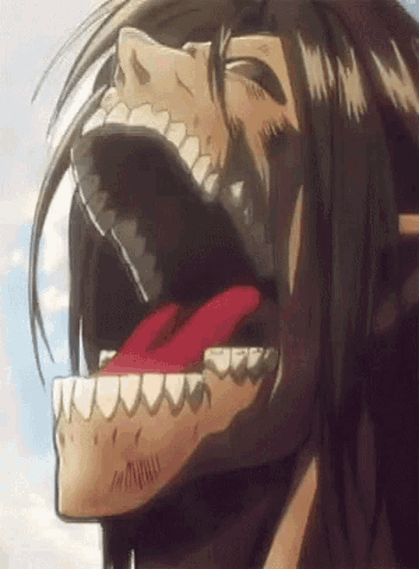 a close up of a cartoon character 's mouth with a red tongue sticking out .