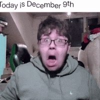 a man with glasses is making a funny face with the date december 9th