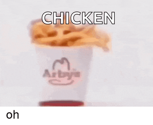 a blurry picture of a chicken sandwich with the words chicken on it
