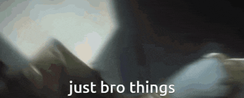 a close up of a person 's hand with the words `` just bro things '' written in white letters .