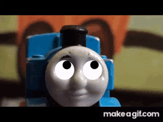 a close up of thomas the train 's face with make a gif.com in the corner