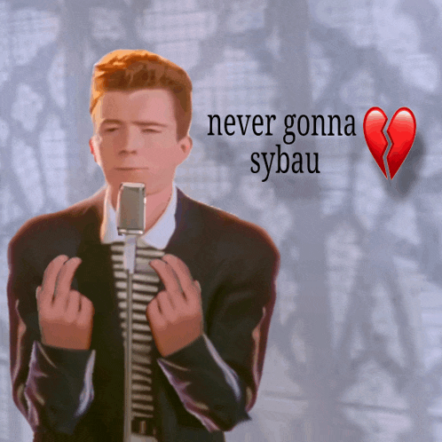 a man singing into a microphone with the words " never gonna sybau " above him