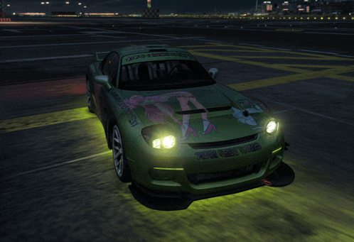 a green car with a sticker on the front that says " run the wing "