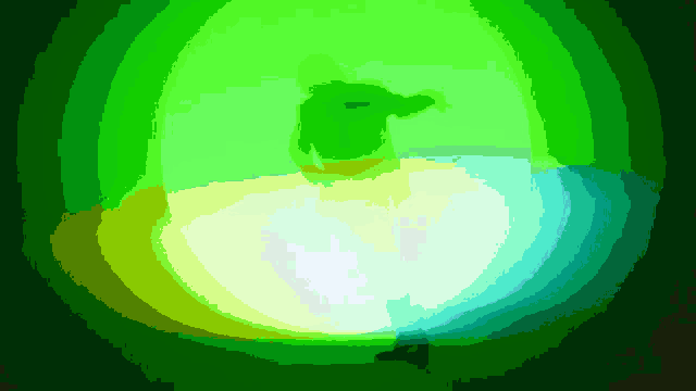 a silhouette of a person is surrounded by a green light