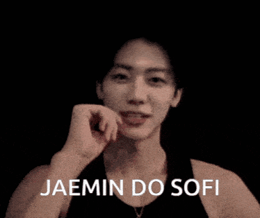 a man is smiling with the words jaemin do sofi written below him