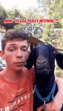 a man holding a black goat with the words man is 666 really mooning