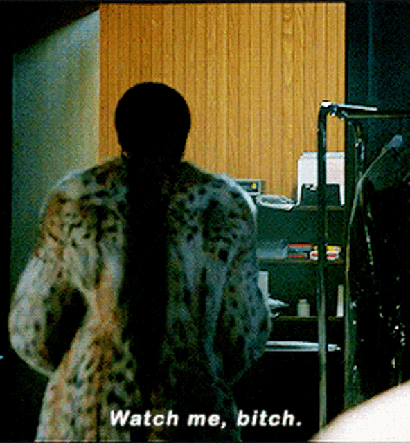 a woman in a leopard print fur coat says watch me bitch
