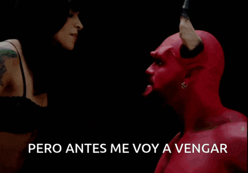 a woman is kissing a red demon with the words pero antes me voy a vengar above them