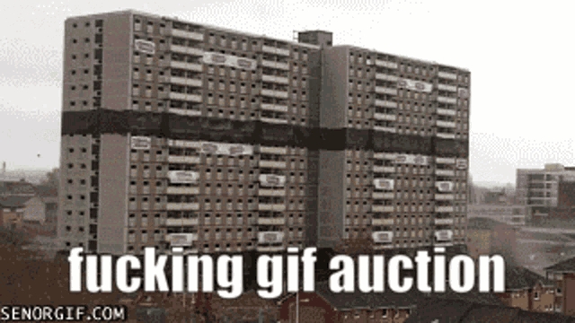 a gif of a building with the words fucking gif auction