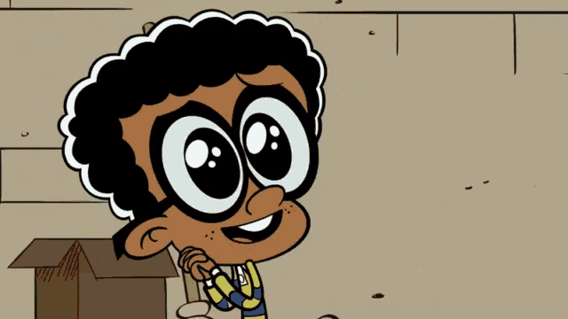 a cartoon boy with big eyes is smiling and holding a box