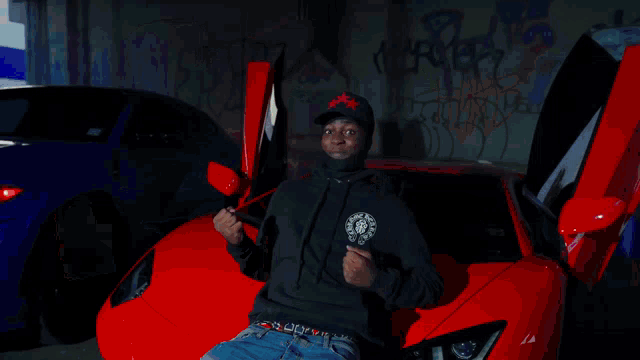 a man in a red and white jacket with the word fly on the back