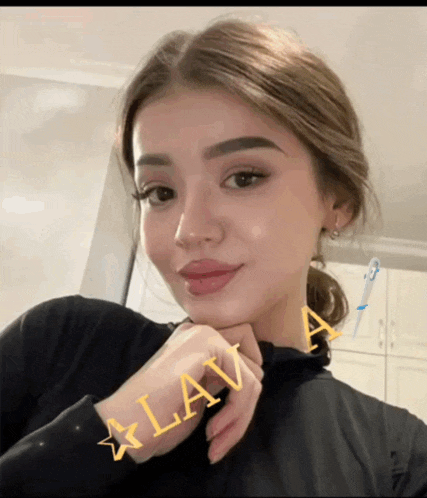 a close up of a woman with the word lava on her arm
