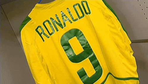 a yellow and green ronaldo jersey with the number 9 on it