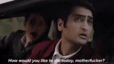 two men are sitting in a car and one of them is asking the other how would you like to die today , motherfucker .