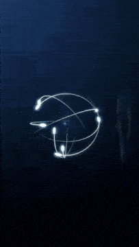 a blue sphere with a light inside of it on a dark blue background .