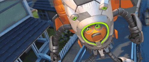 a robot with a yellow face and green eyes is flying over a house