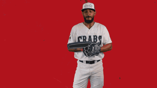 a man wearing a crabs jersey with the number 4 on it