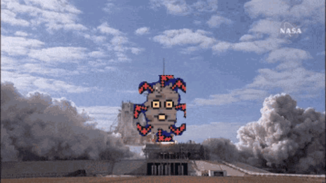a picture of a rocket being launched with the nasa logo in the corner
