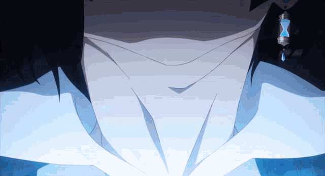 a close up of a person 's neck with earrings