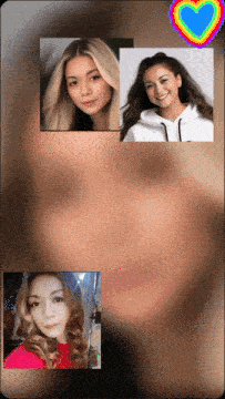 a blurry picture of three women with a heart in the middle