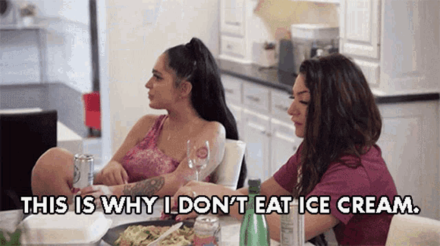 two women are sitting at a table with the words " this is why i don 't eat ice cream " above them