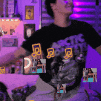 a man wearing a black shirt that says arctic monkeys on it