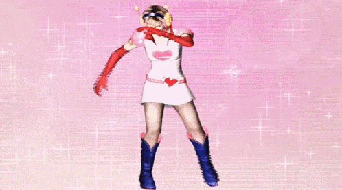a woman in a white dress with a heart on the waist is dancing on a pink background