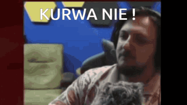a picture of a man with a dog and the words kurwa nie written above him