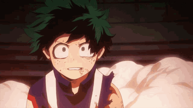 a close up of a person with green hair and a purple shirt