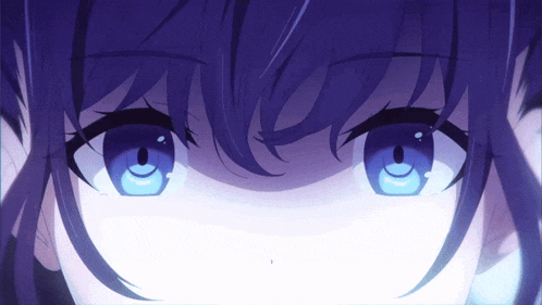a close up of a girl 's blue eyes
