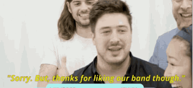 a man says " sorry but thanks for liking our band though " in a video