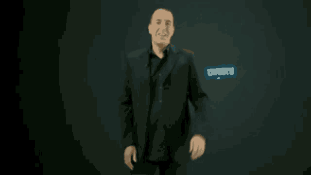 a man in a black suit is standing in front of a sign that says direct 8