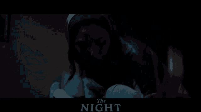 a movie poster for the night shows a woman in a superhero costume