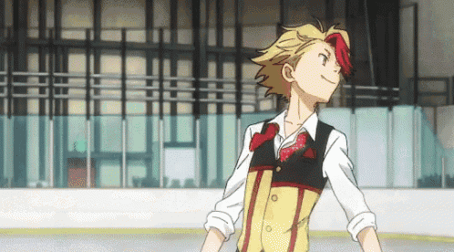 a man is standing on a ice rink wearing a vest and tie .