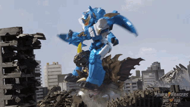 a poster for power rangers dino fury shows a robot fighting a monster