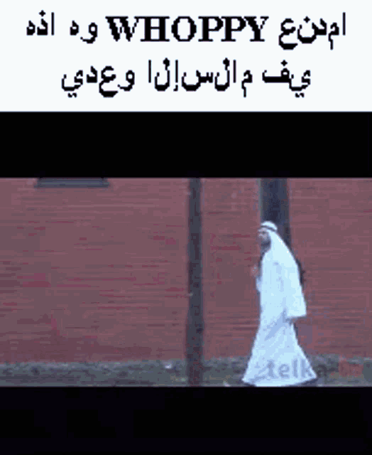 a man in a white dress is walking down the street .