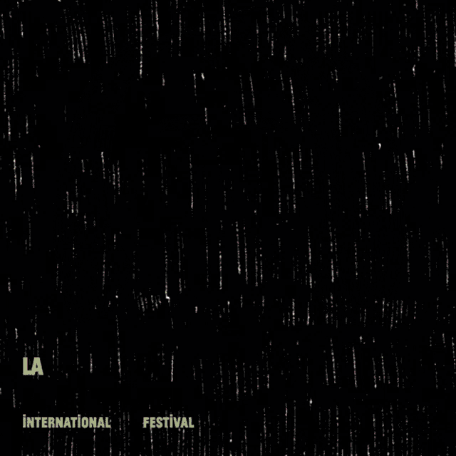 a poster for the guarimba international film festival with a cartoon face