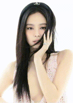 a pixelated image of a woman covering her face with her hair .