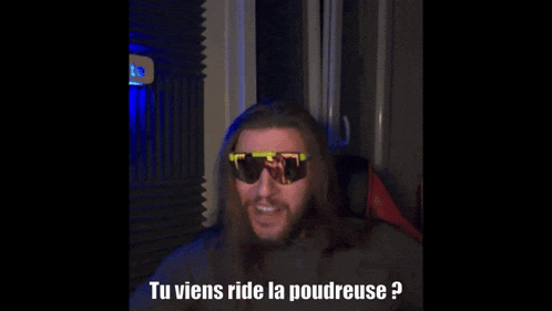 a man wearing sunglasses says tu viens ride la poudreuse ?