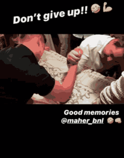 a man is arm wrestling another man with the caption " don 't give up good memories @maher_bnl "