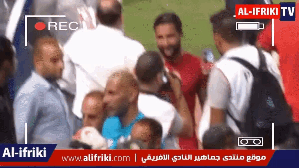 an al-ifriki tv screen shows a group of people talking