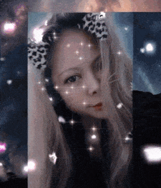 a woman wearing a leopard print headband is surrounded by stars