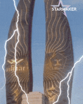 lightning strikes a statue with the word starmaker on the bottom